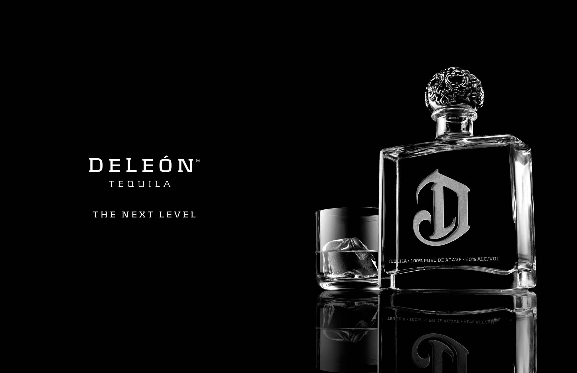 Deleón Tequila Bottle And Ice Glass Picture