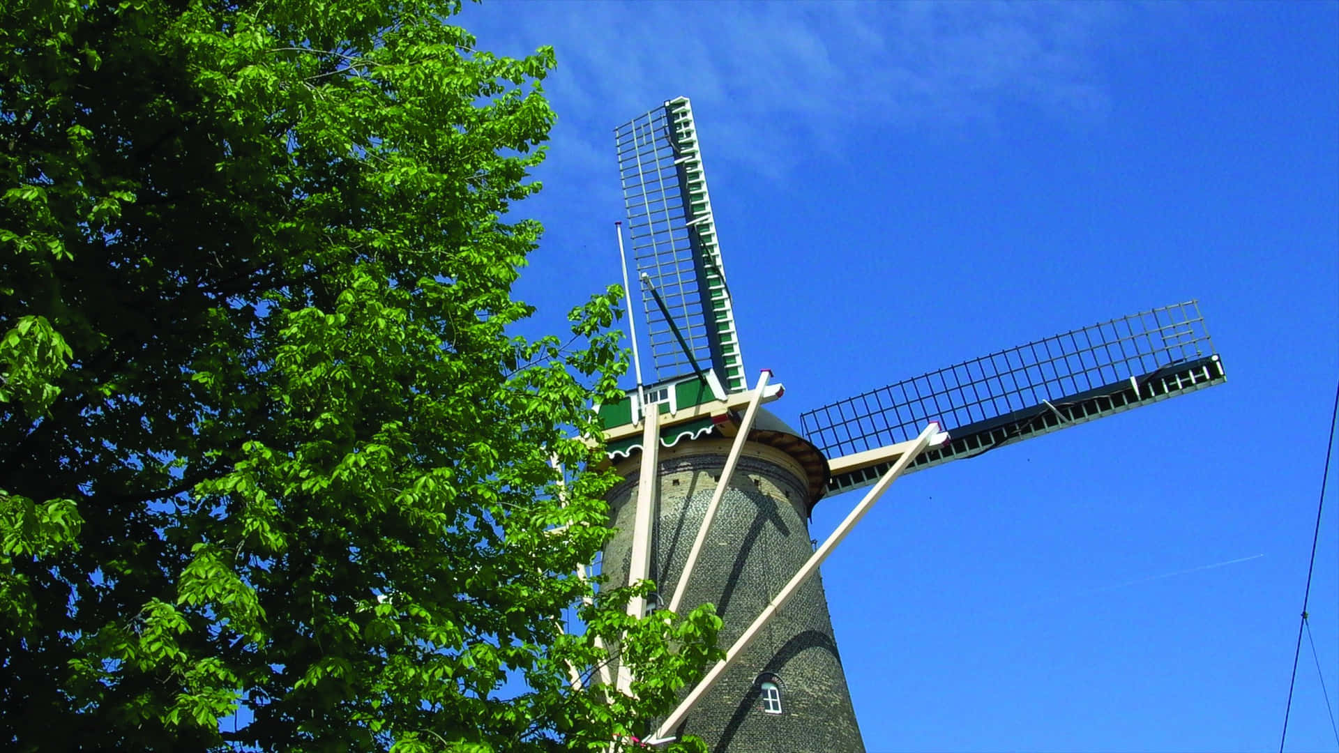 Delft Windmill Against Blue Sky Wallpaper