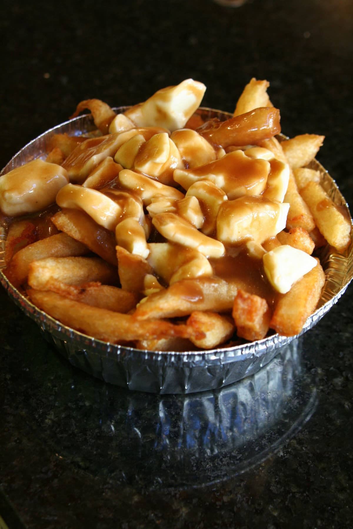 Delicious Bowl Of Canadian Poutine Wallpaper