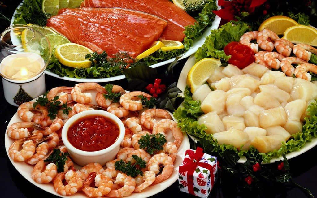 A Plate Of Seafood With Lemons And Limes