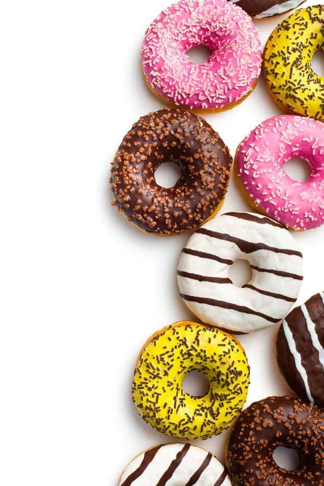 Enrække Af Donuts Med Forskellige Farver