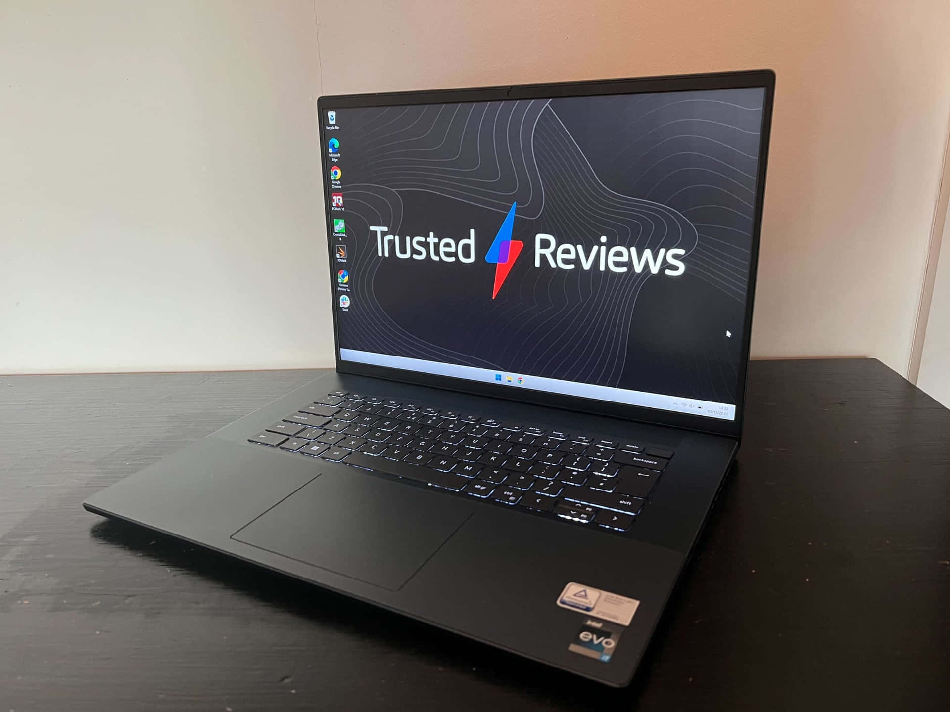 A Laptop With The Word Trusted Reviews On It