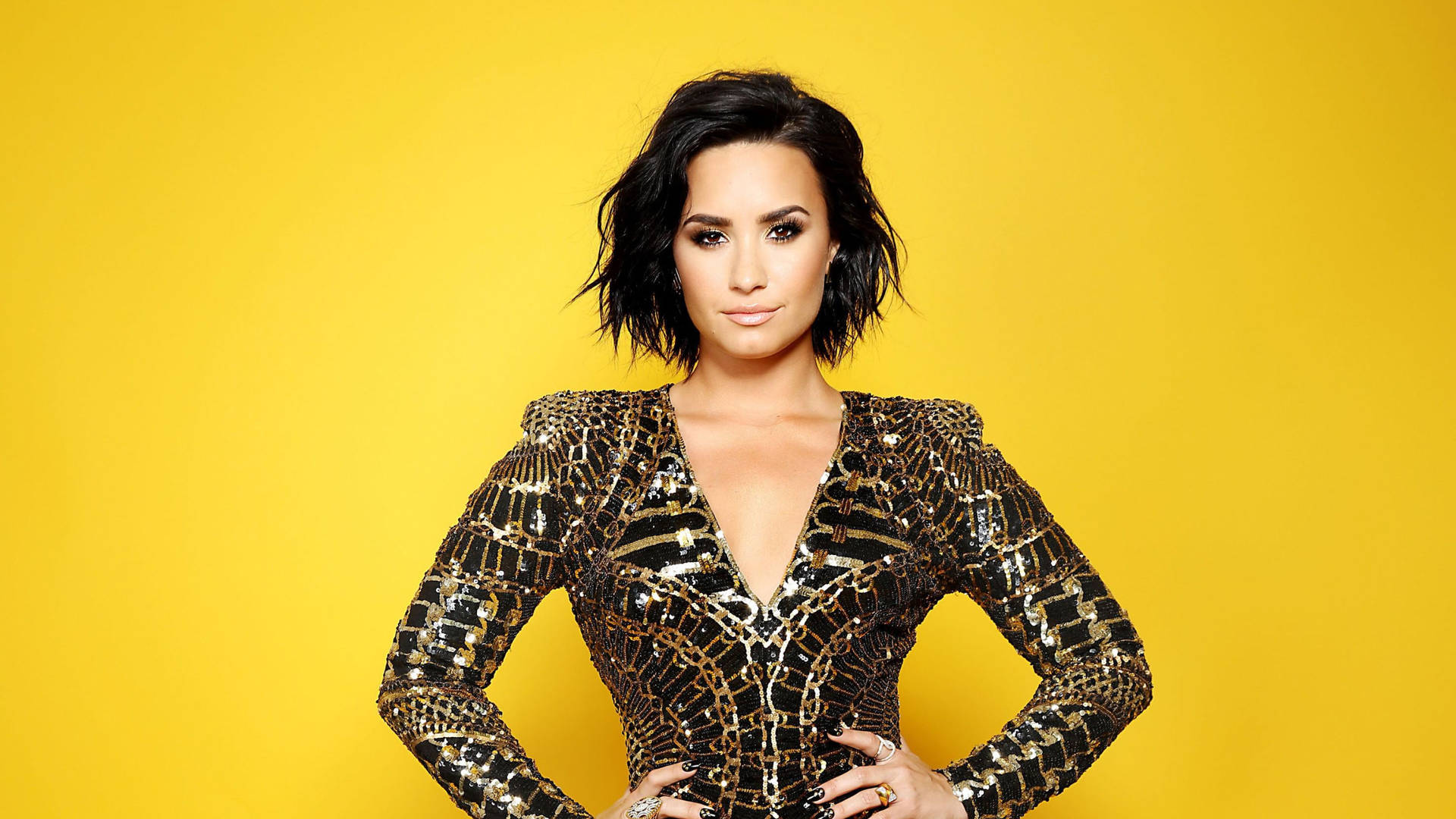 Demi Lovato Black And Gold Outfit Background