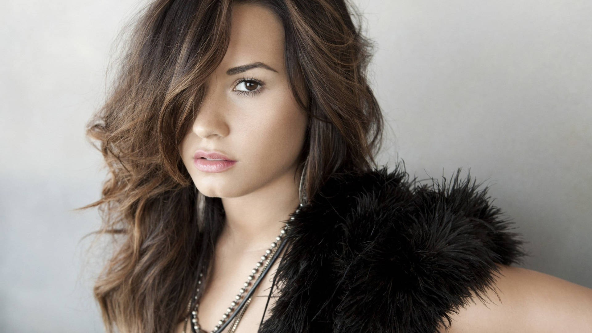 Demi Lovato In Furry Dress Background