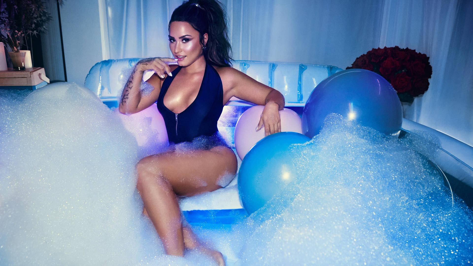 Demi Lovato In Inflatable Pool Background