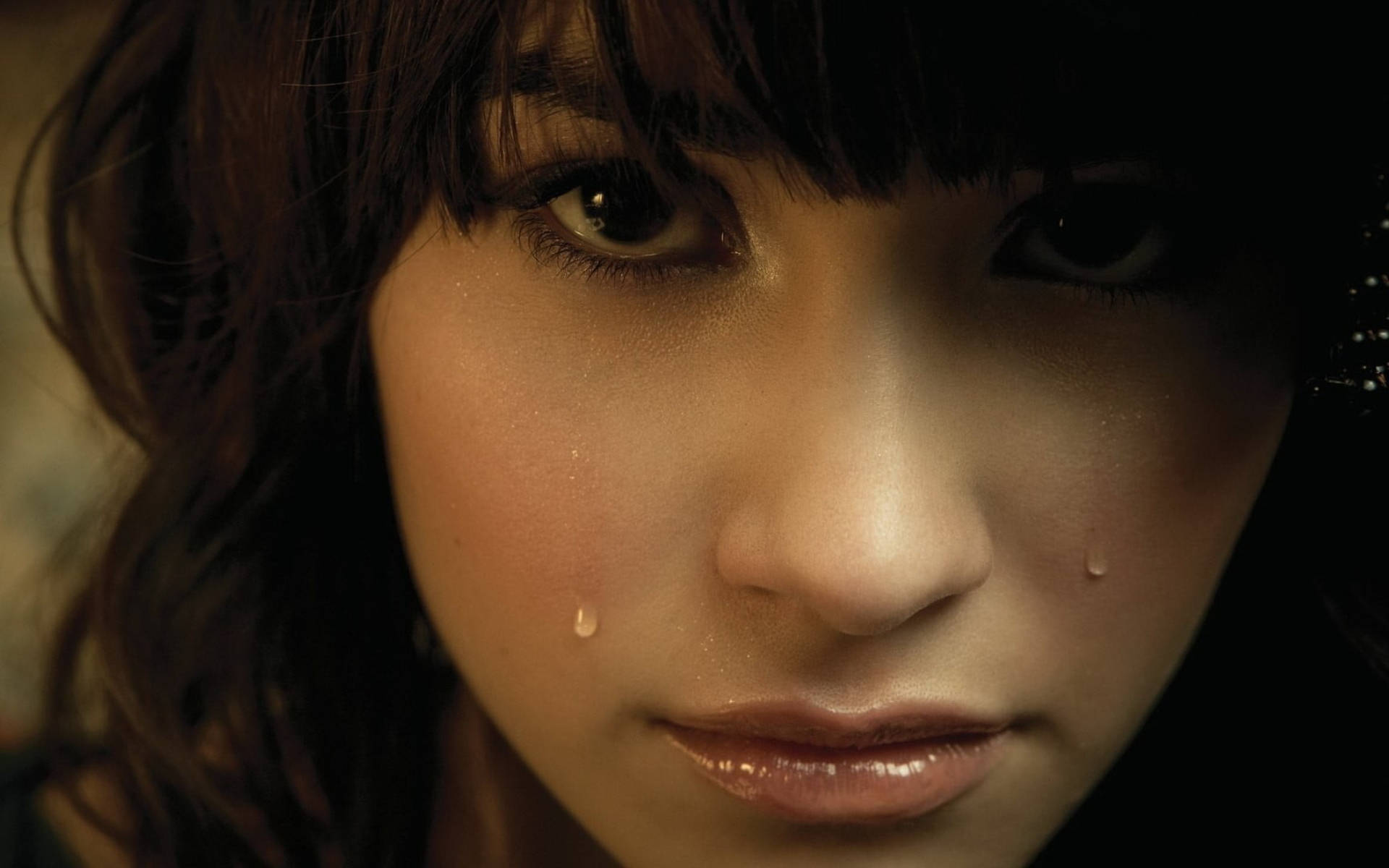 Demi Lovato In Tears Background