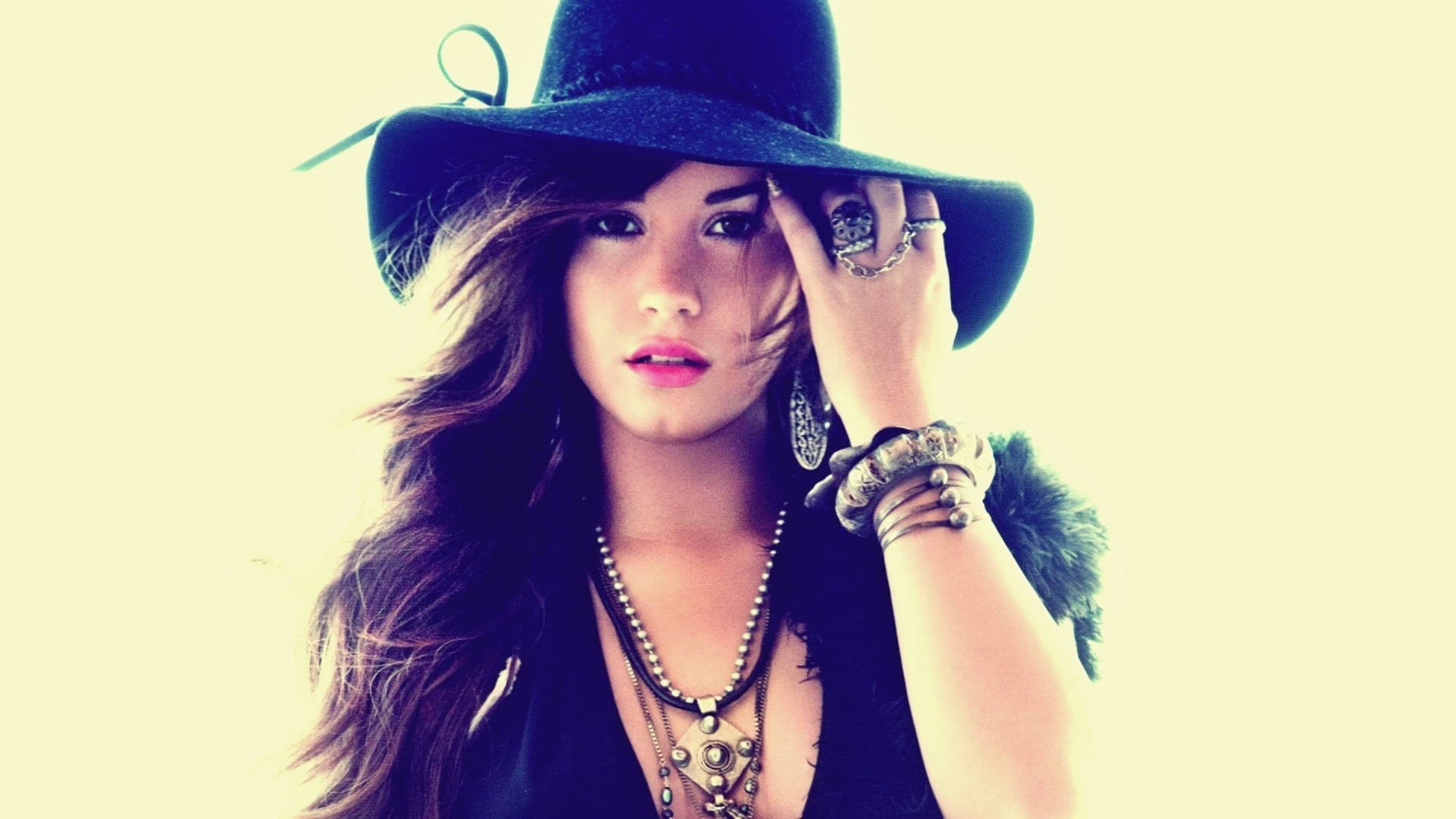 Demi Lovato With Black Hat Background