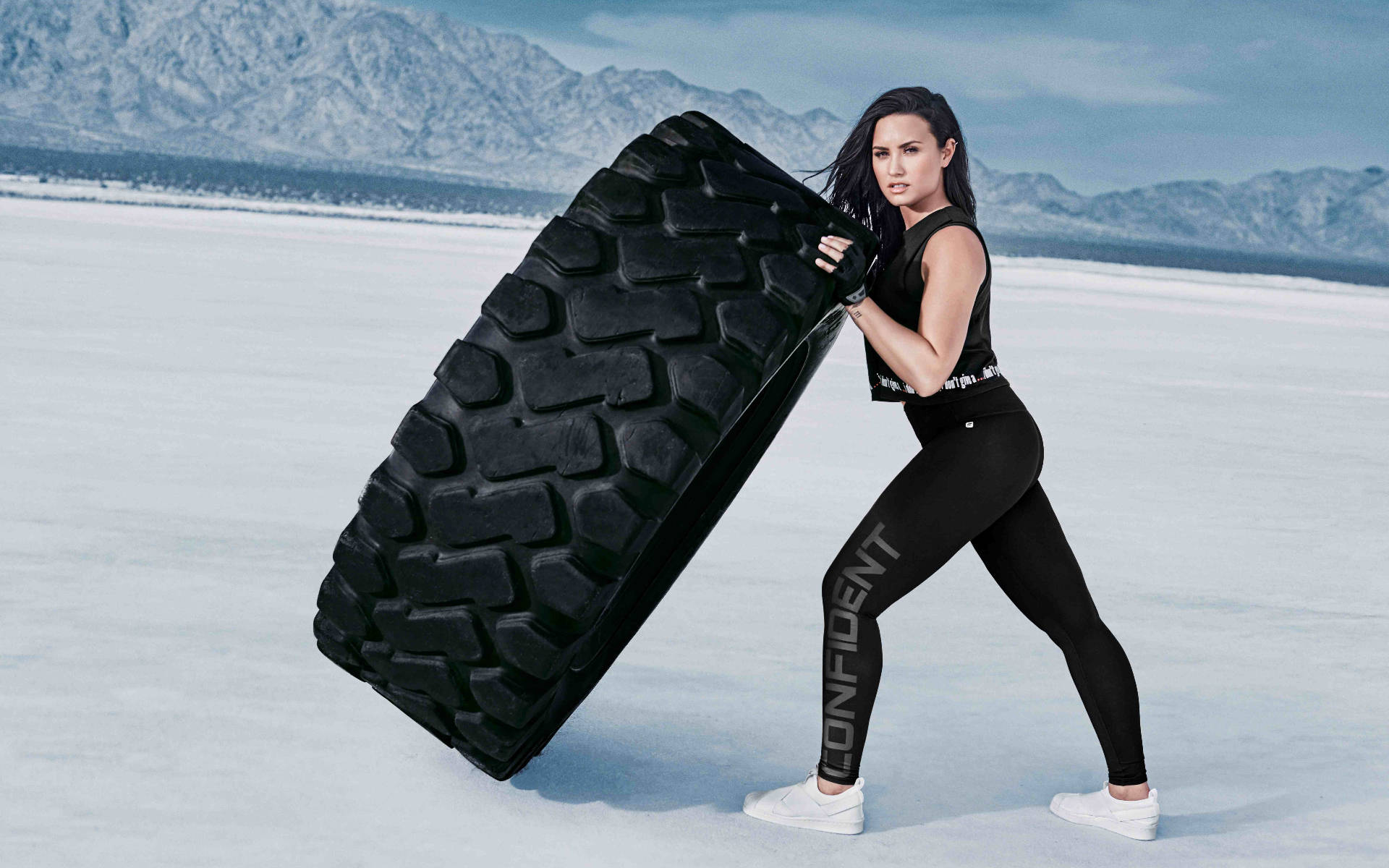 Demi Lovato With Tire Background