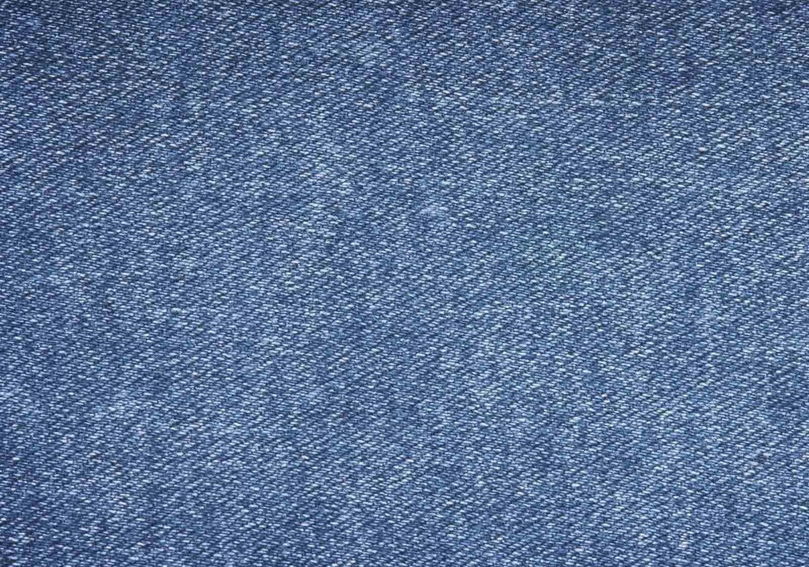 Unelegante Par De Jeans De Mezclilla Real, De Color Azul Profundo. Fondo de pantalla