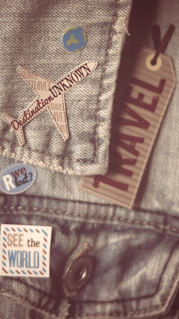 Denim Jacket With Travel Patches Wallpaper