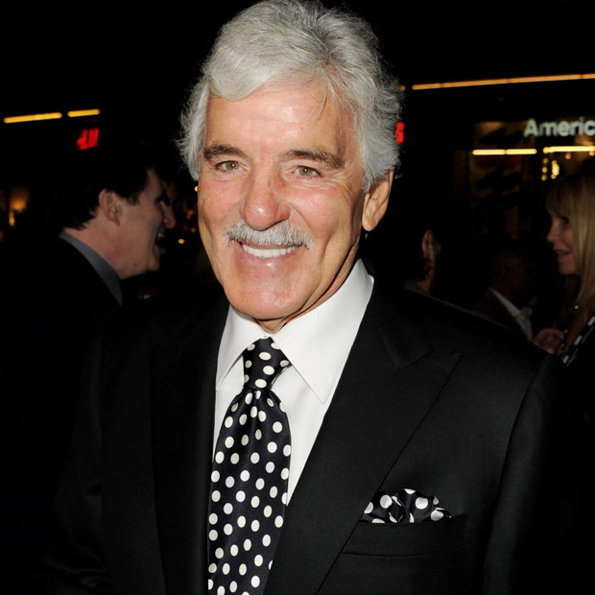 Dennis Farina posing in a tailored suit Wallpaper
