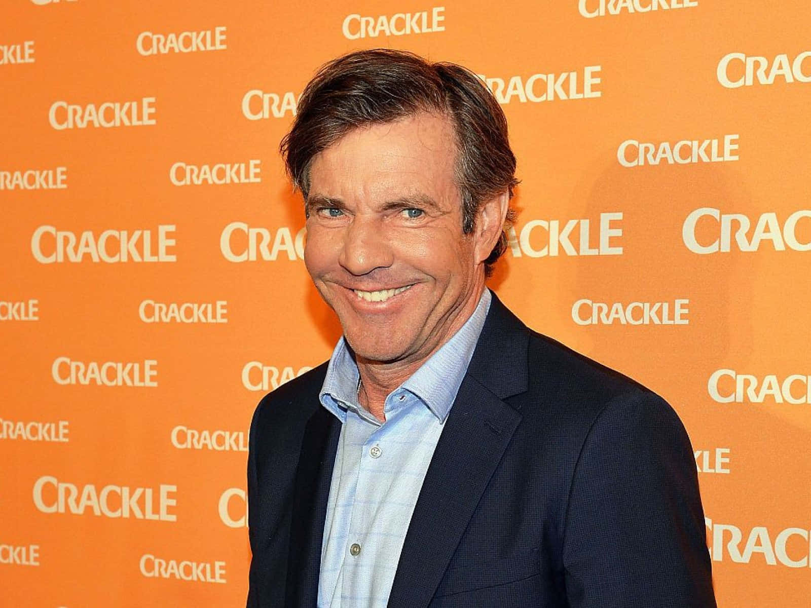 Dennisquaid Is An American Actor Known For His Roles In Films Such As 
