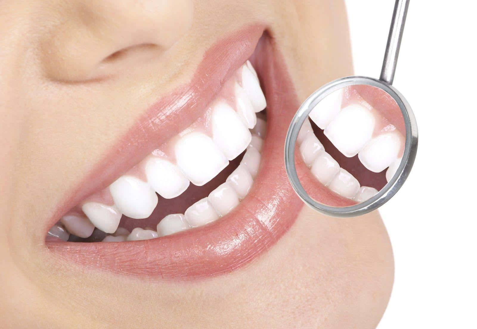 A Woman Is Holding A Magnifying Glass Over Her Teeth