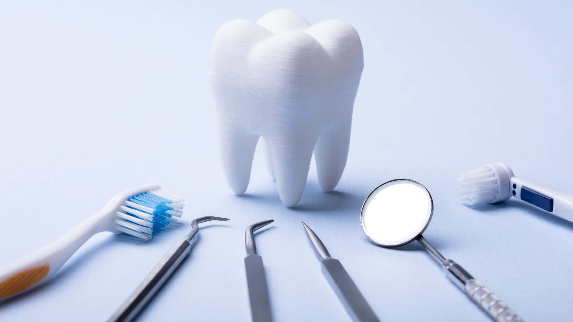 Dental Care Essentials Toolsand Tooth Wallpaper