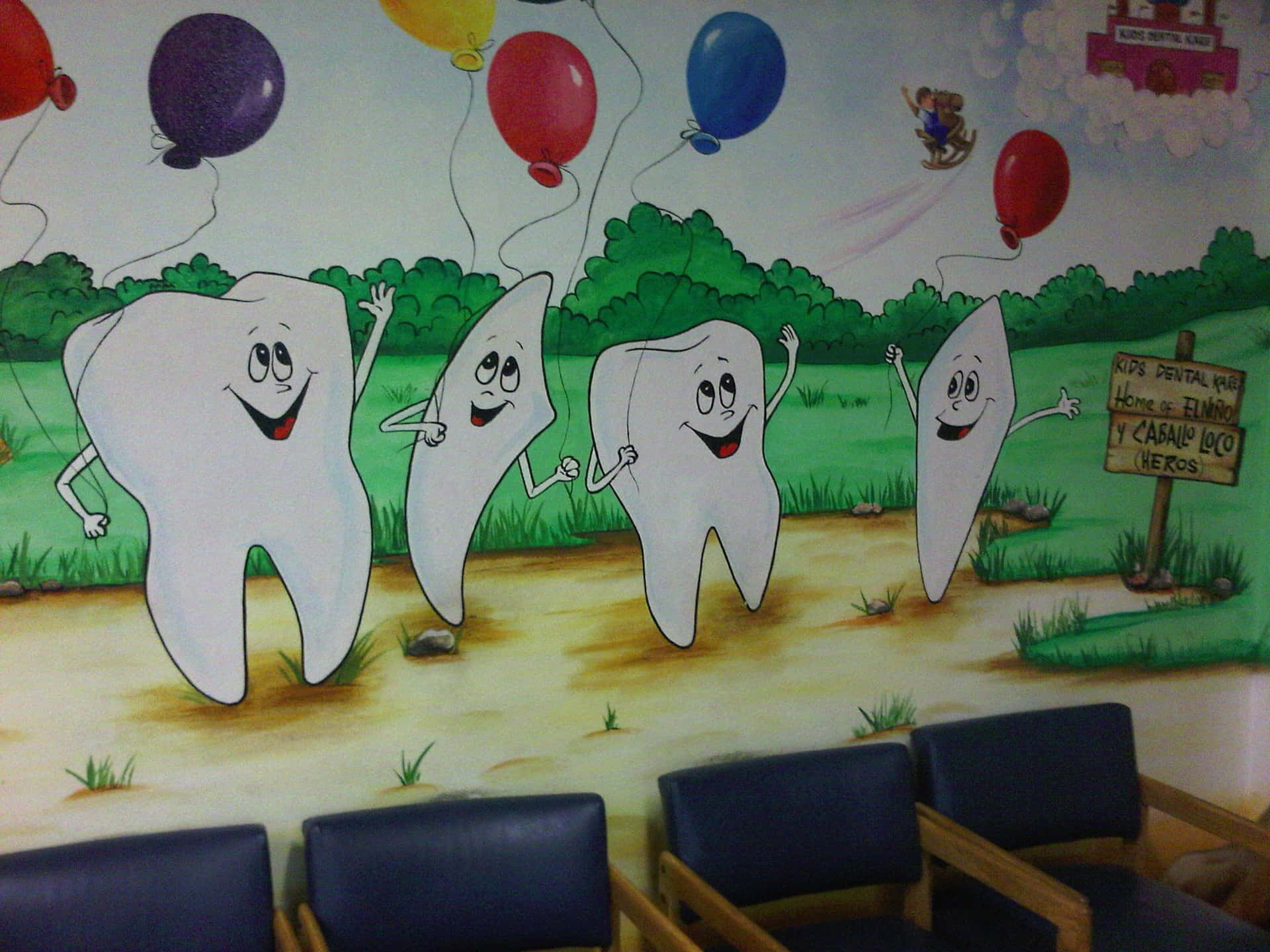 Smiling dentist holding dental equipment in a modern dental office