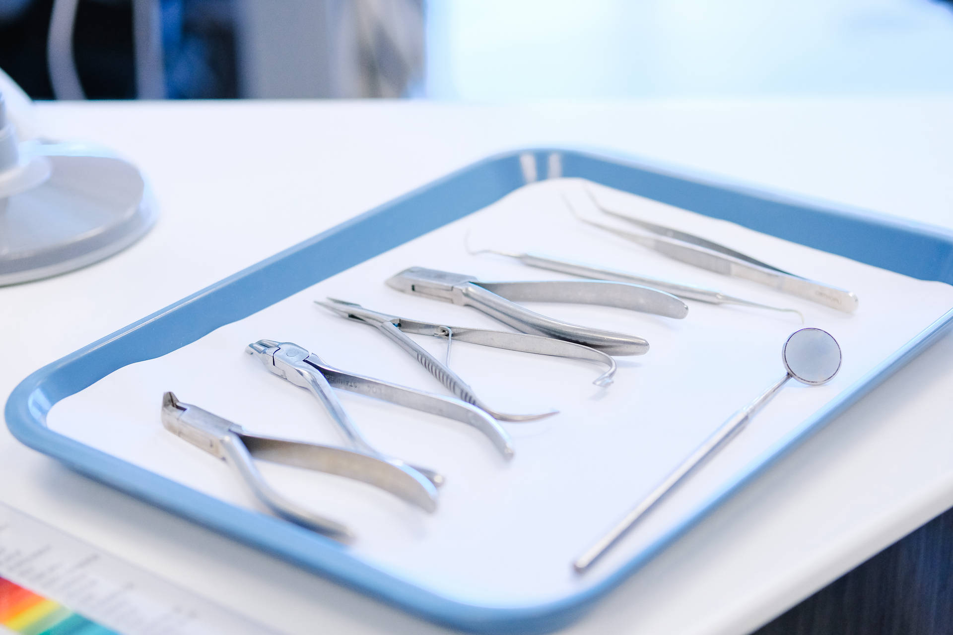 Dentistry Tools On Blue Tray Wallpaper
