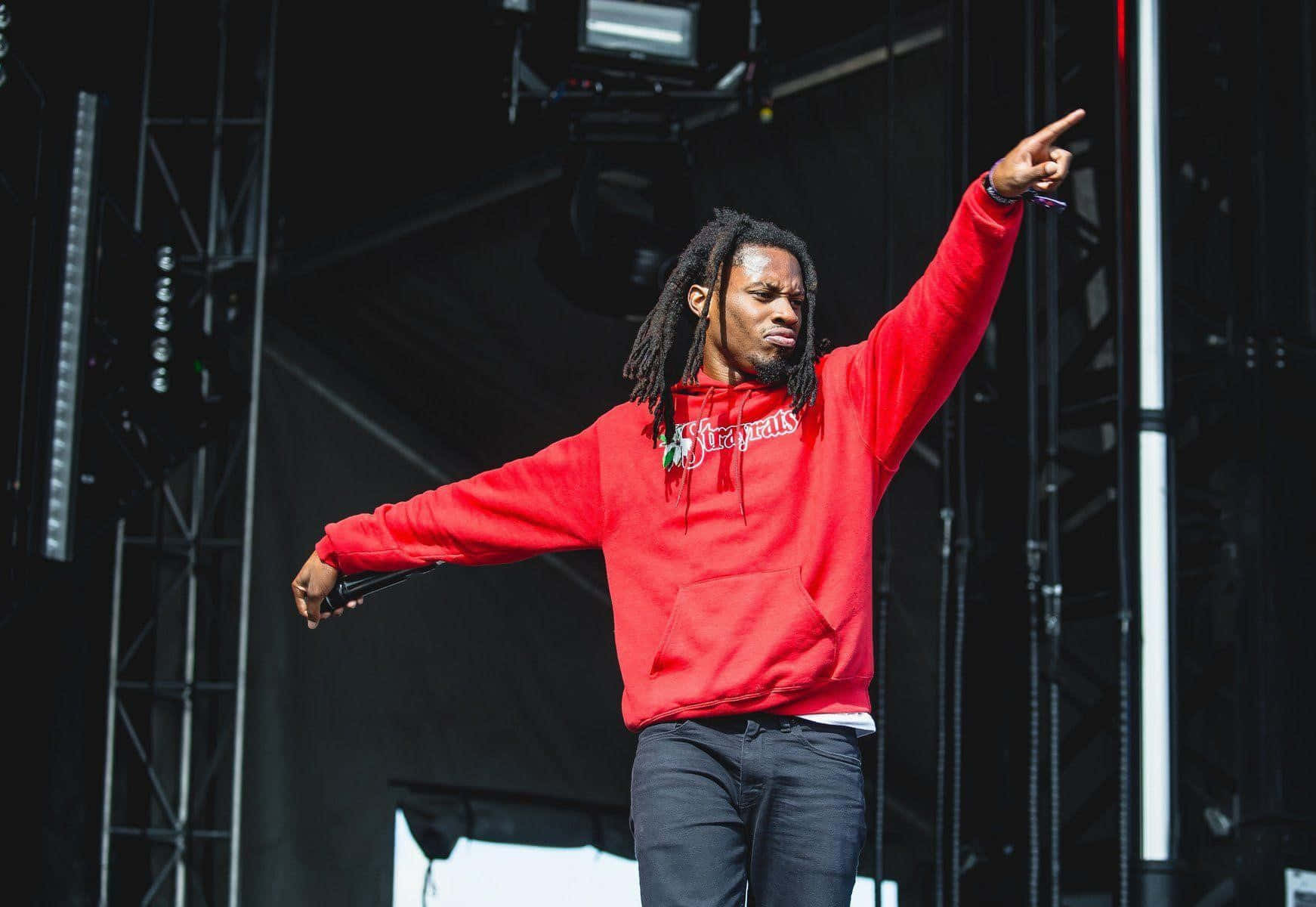 Denzel Curry Performing Live Red Hoodie Wallpaper