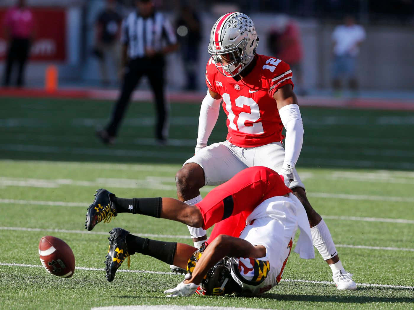 Denzel Ward in action during Ohio State vs Maryland Terrapins football game. Wallpaper
