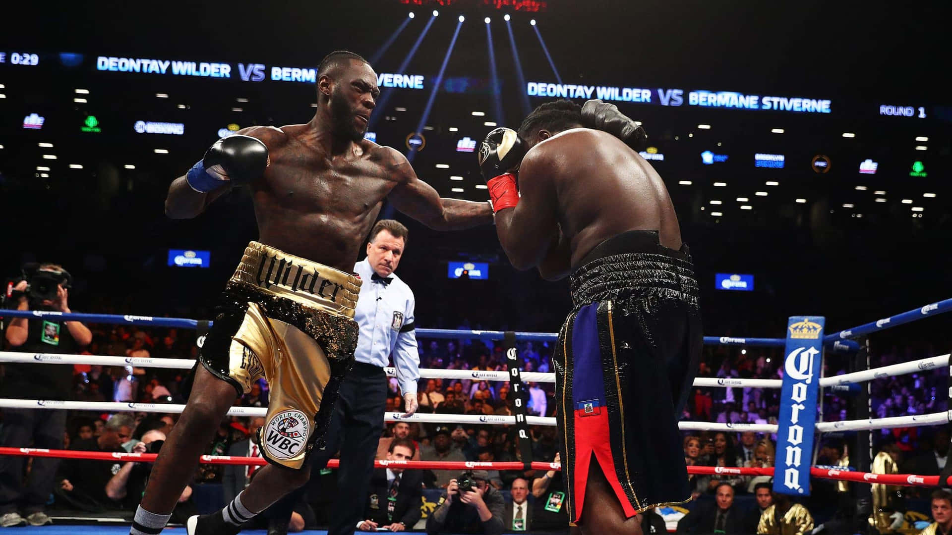 Deontay Wilder Dominating Boxing Match Wallpaper