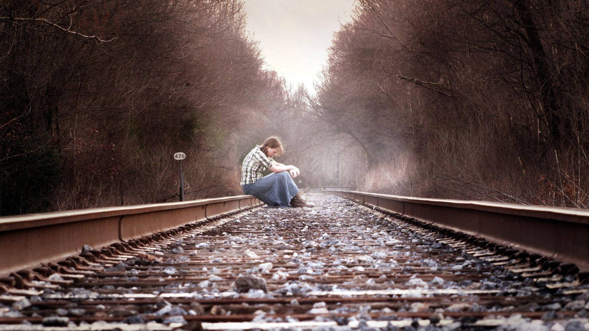 Depressed Girl On Railway Wallpaper