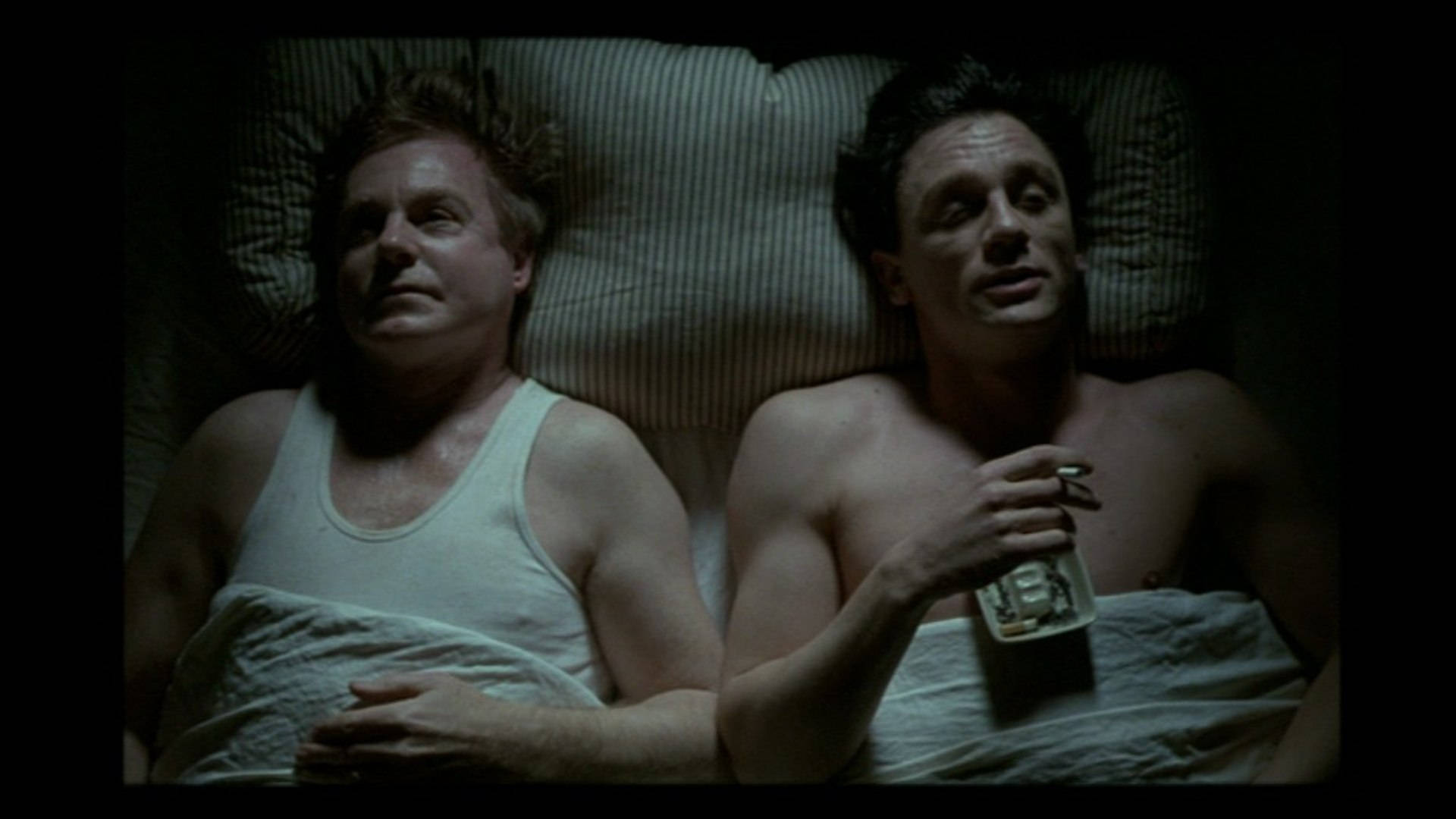 Derek Jacobi And Daniel Craig In Bed Wallpaper