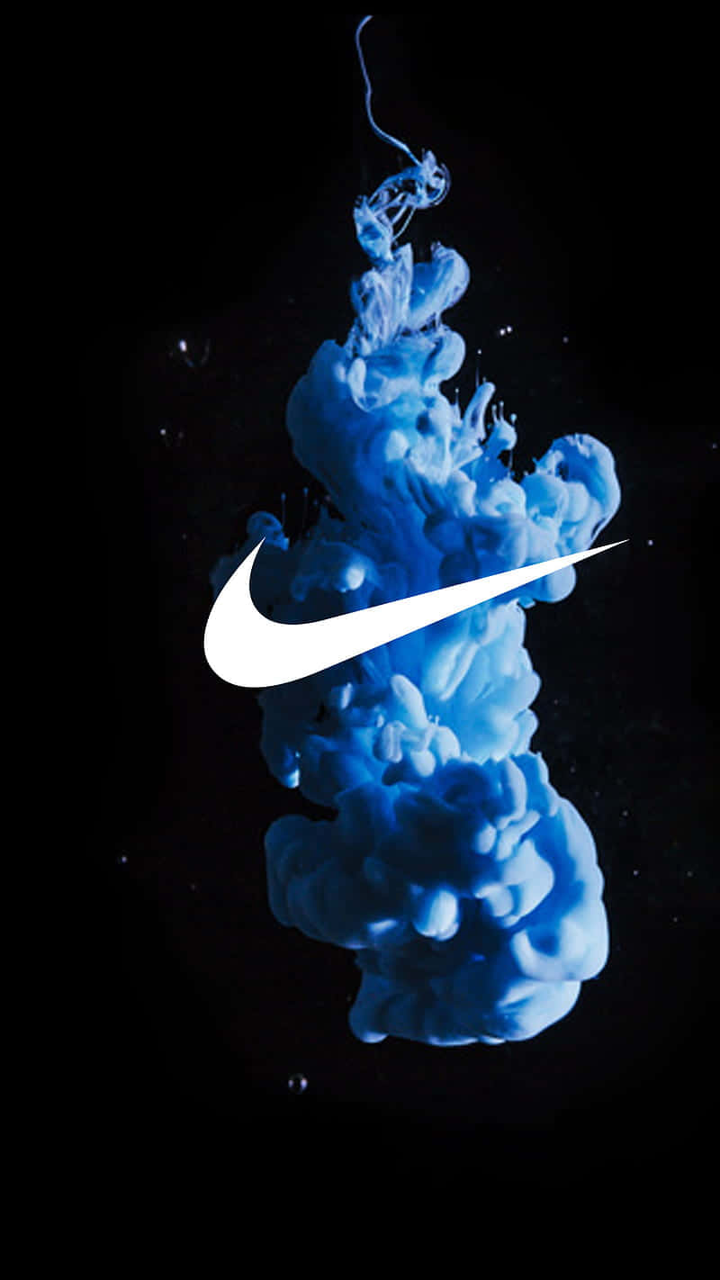 Descubrelas Vibrantes Zapatillas Nike Azules. Fondo de pantalla