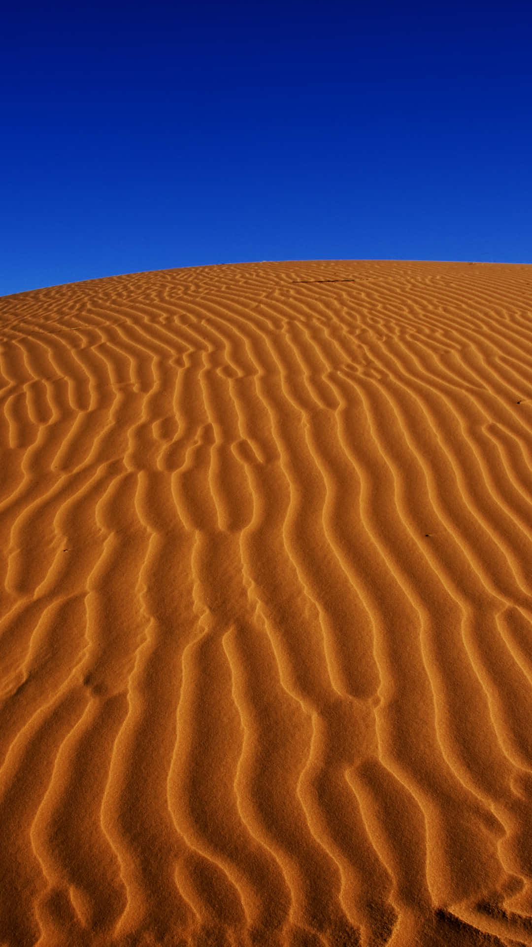 Wallpaperblå Himmel Över Saharaöknen Iphone-bakgrundsbild. Wallpaper