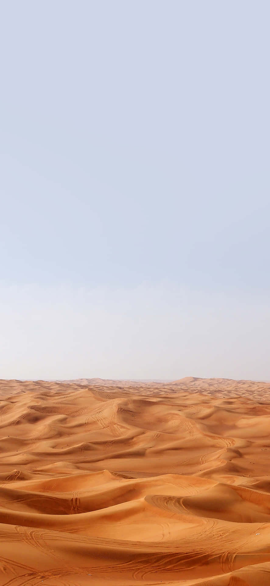 Bleibensie Überall In Der Wüste Mit Ihrem Iphone Verbunden Wallpaper