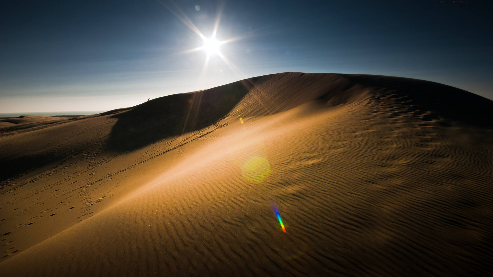 Desert Sun On Top Of Dunes Wallpaper