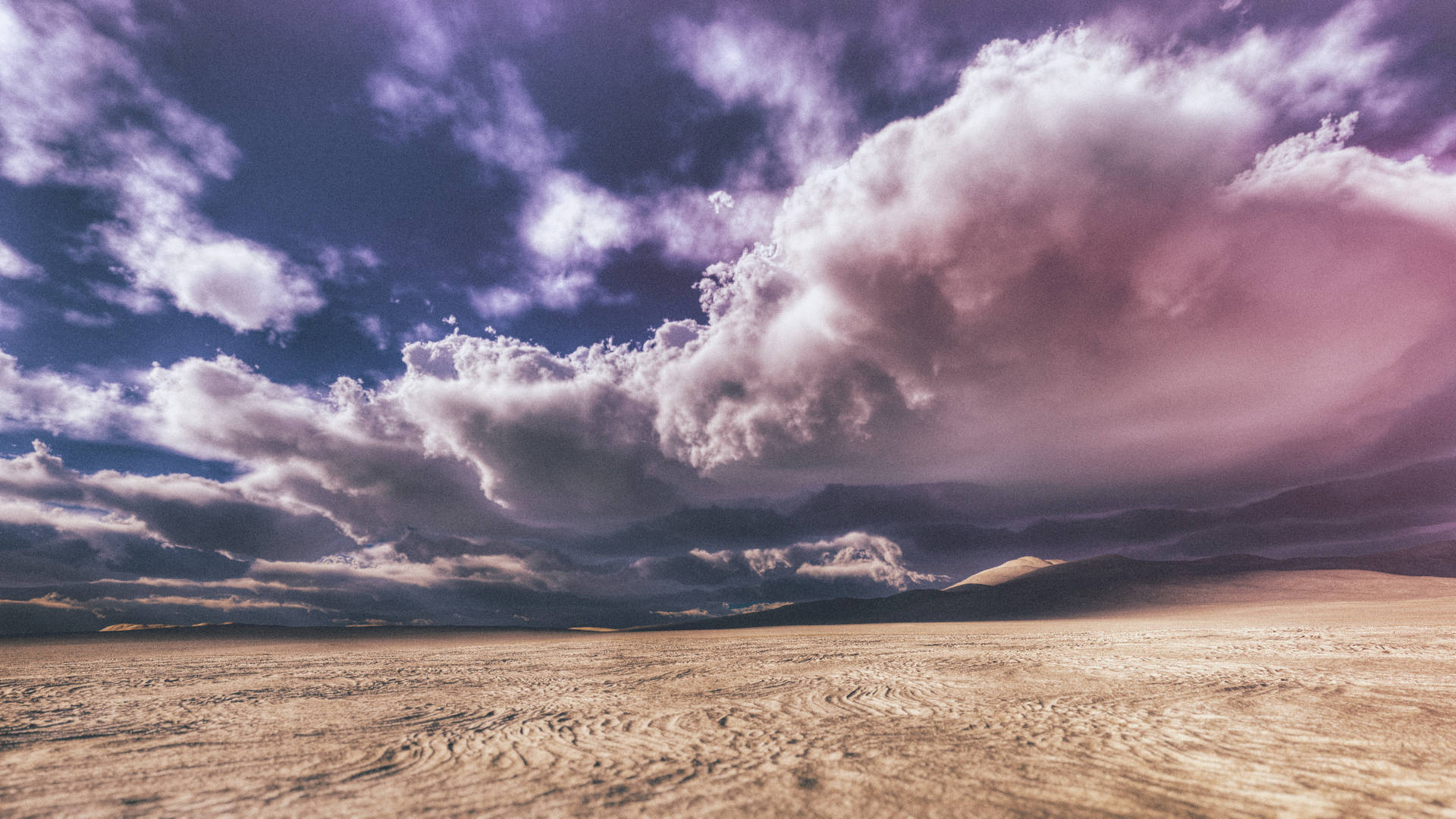 "The Desert Under Dense Clouds" Wallpaper