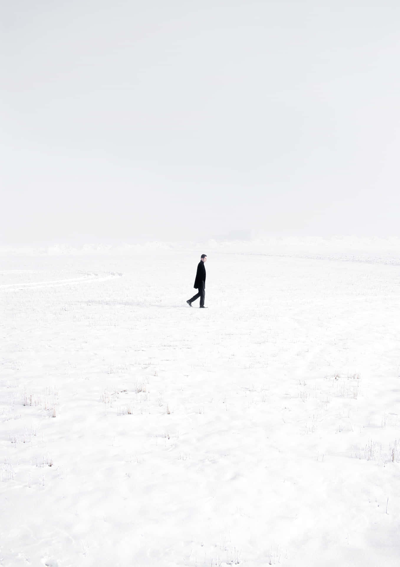 Desolate Snow Land Portrait Lonely Man Wallpaper