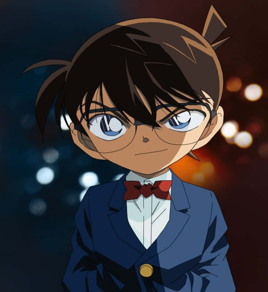 A Boy In A Suit And Bow Tie