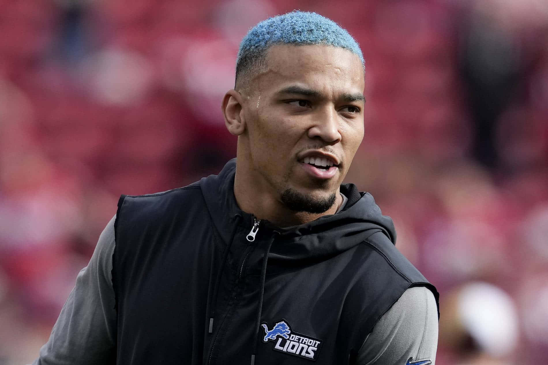 Detroit Lions Speler Met Blauw Haar Achtergrond