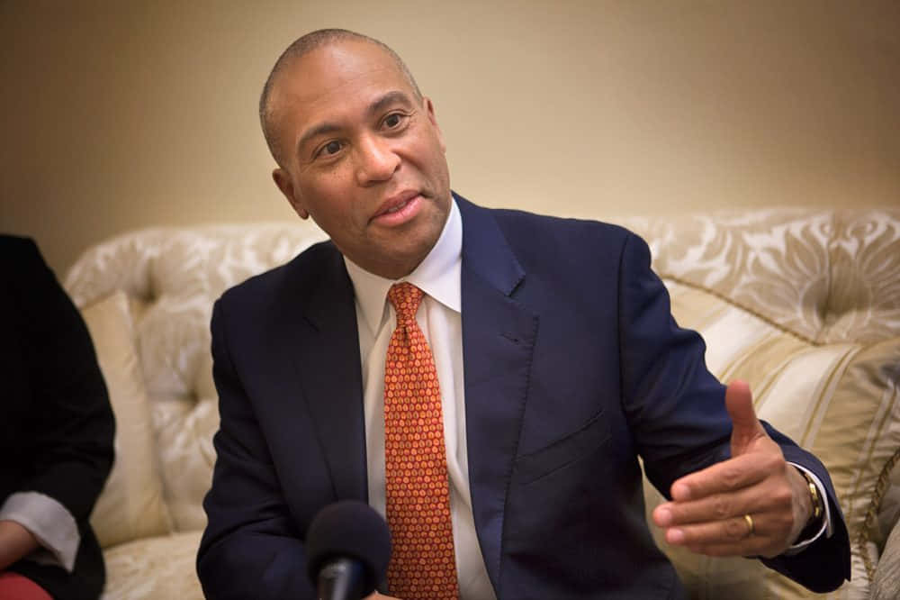 Deval Patrick Engaged in a Media Interview Wallpaper
