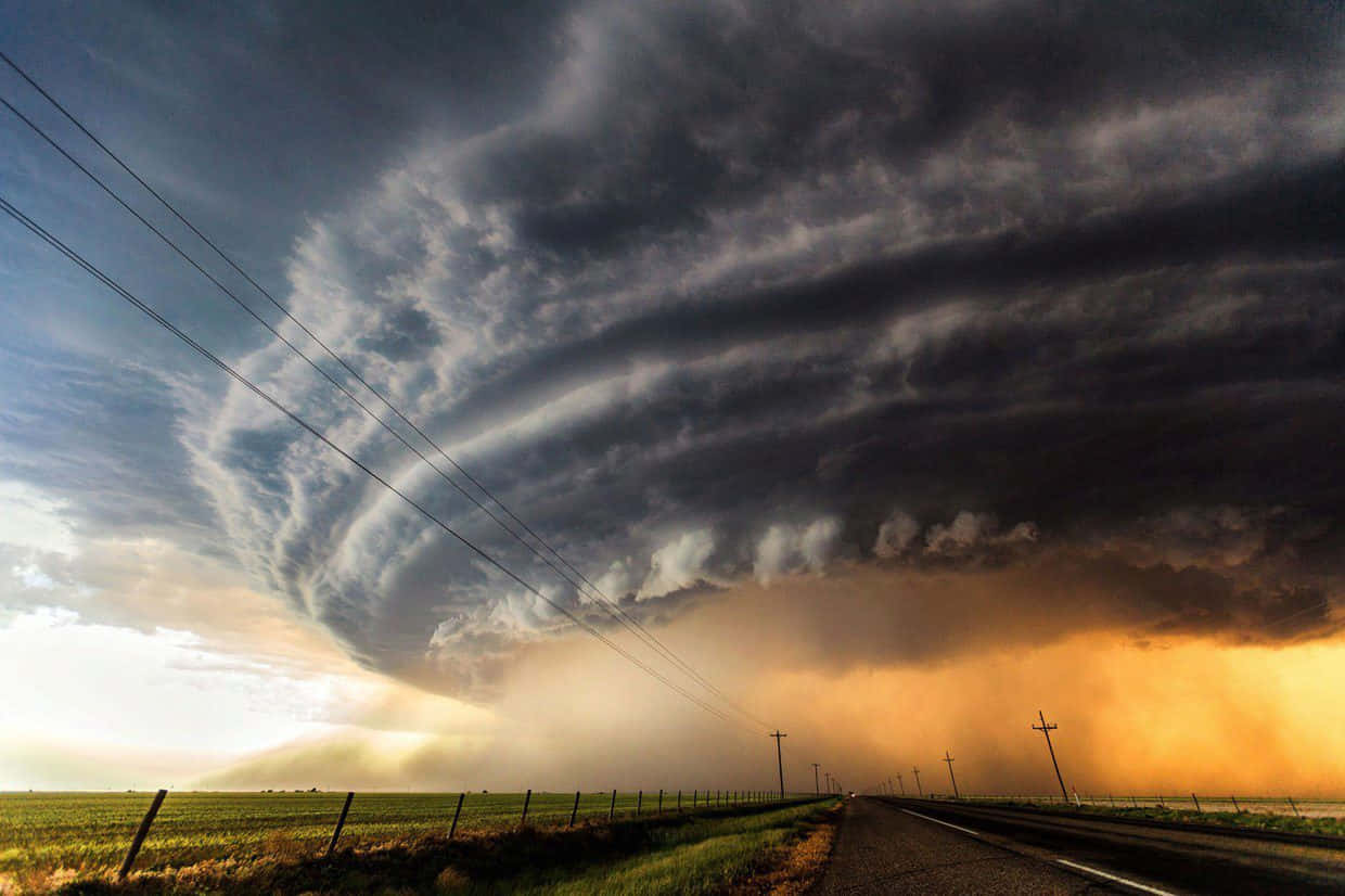 Devastating Power Of Nature - A Tornado In Action Wallpaper