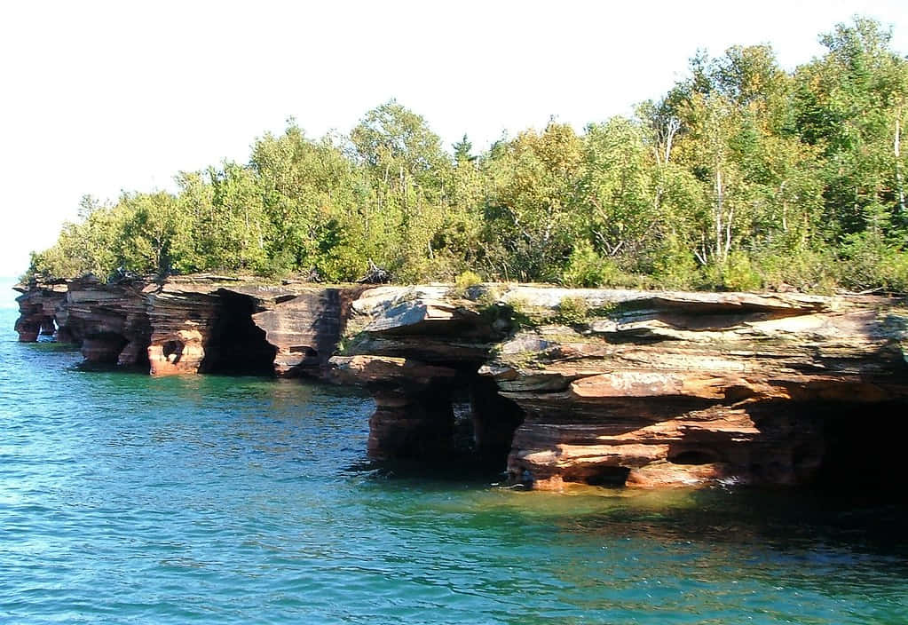 Download Devils Island Sea Caves Wisconsin Wallpaper | Wallpapers.com