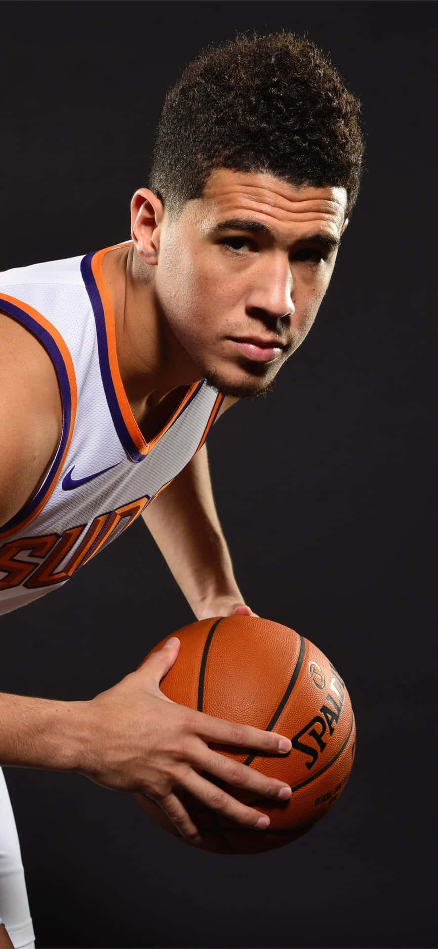 Download Phoenix Suns Star Devin Booker Right Before Action Wallpaper
