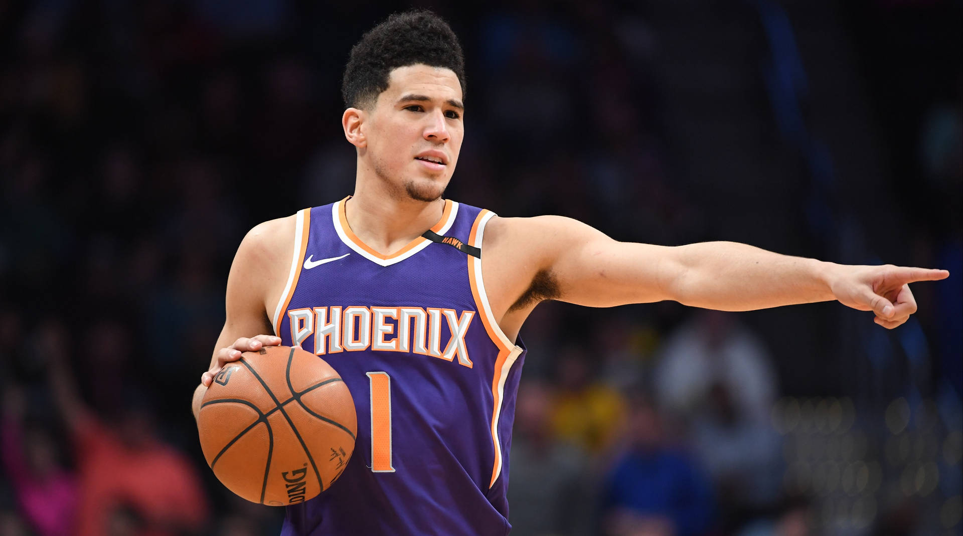Devin Booker Pointing At Something Wallpaper