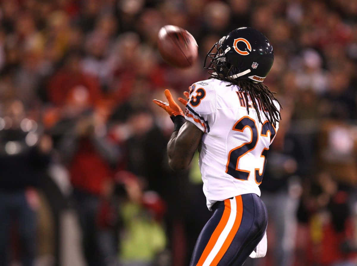 Devin Hester Catching Football Game Wallpaper