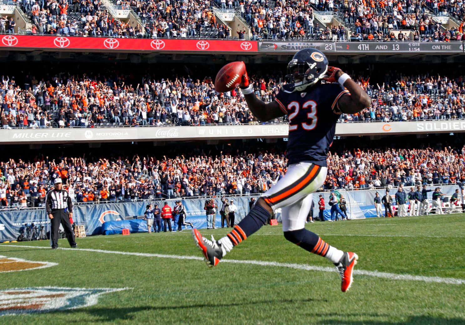 Devin Hester Celebrating Touchdownat Soldier Field Wallpaper