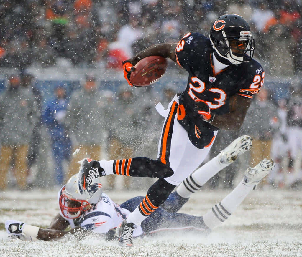 Devin Hester Evading Tacklein Snow Wallpaper