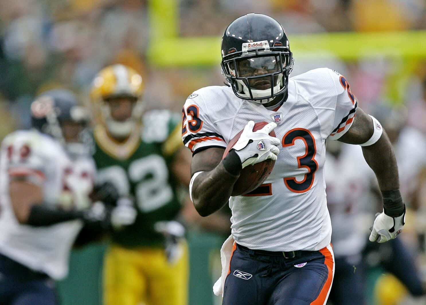 Devin Hester Løper Med Fotball Bakgrunnsbildet