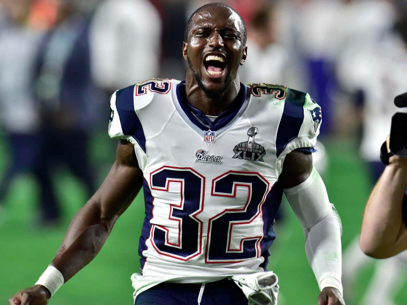 Devin Mccourty Toiminnassa Jalkapallo-ottelussa Taustakuva