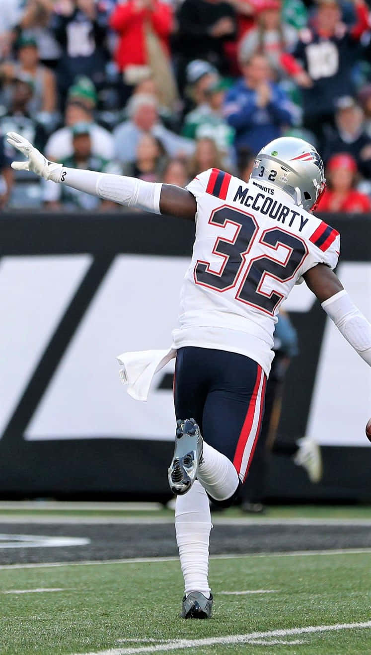 Devin Mccourty En Action Lors D'un Match Fond d'écran