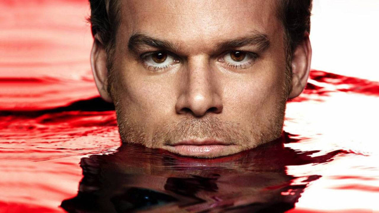Intense Dexter Morgan immersed in a Red Pool. Wallpaper