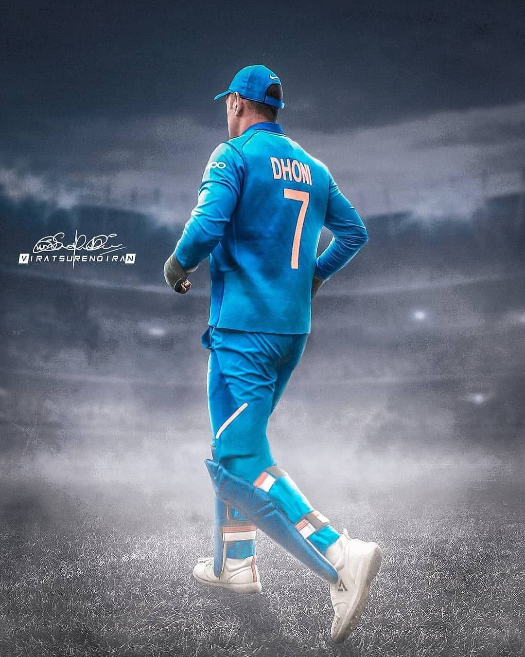 Dhoni 7 Running Into The Field Wallpaper