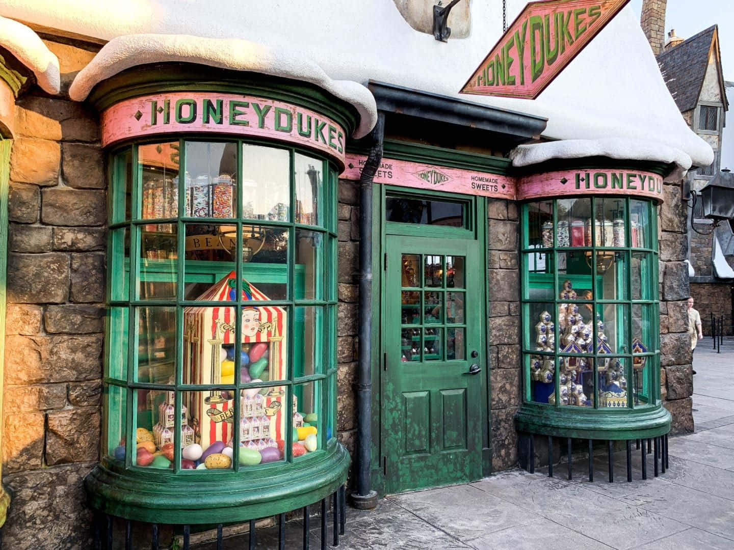 Magical Diagon Alley bustling with wizards and witches Wallpaper