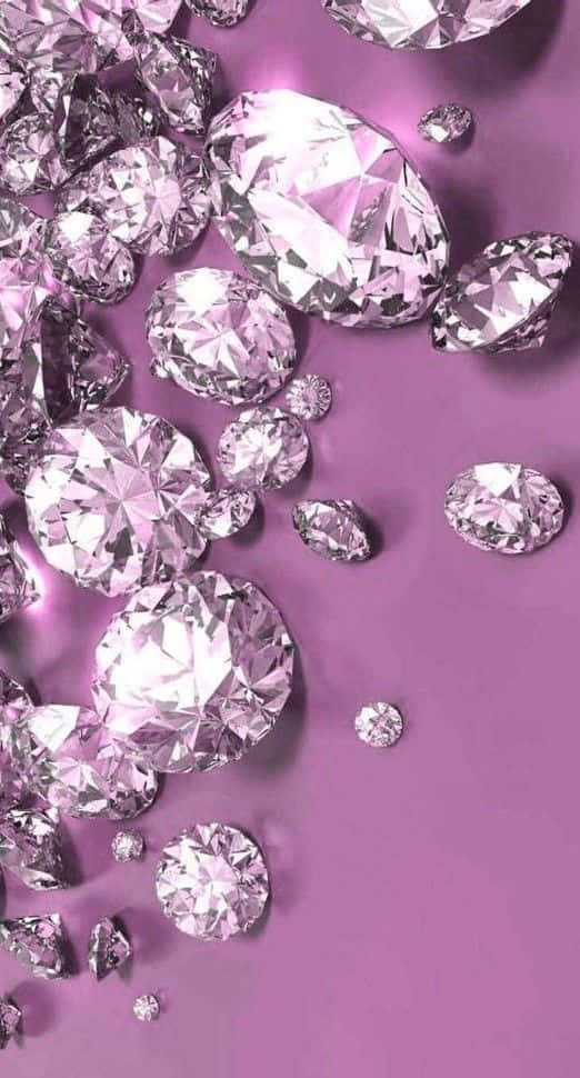 A Bunch Of Diamonds On A Purple Background Wallpaper