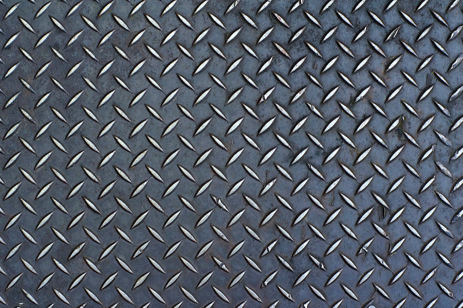 A shining diamond plate background in silver