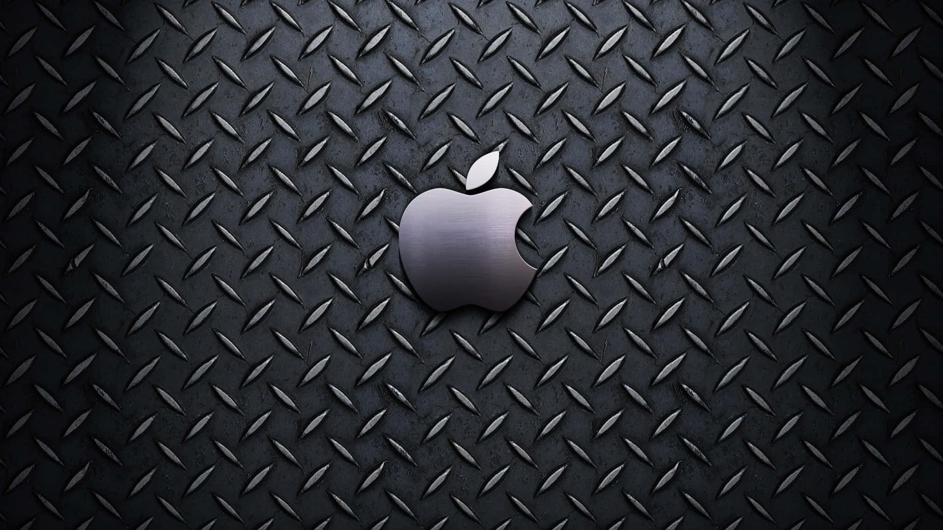 Apple Logo On A Black Diamond Pattern Wallpaper